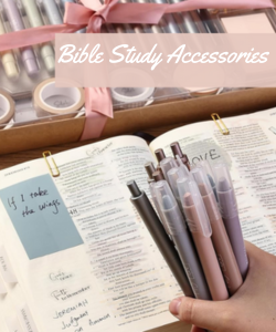 Bible study accessories including pens and a devotional journal
