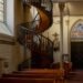 The Staircase of Loretto inside Loretto Chapel in Santa Fe, New Mexico, a spiral wooden staircase believed to be built through the intercession of Saint Joseph.