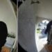 Ring camera screenshot of a man standing at a family’s front door during a frightening viral doorstep incident